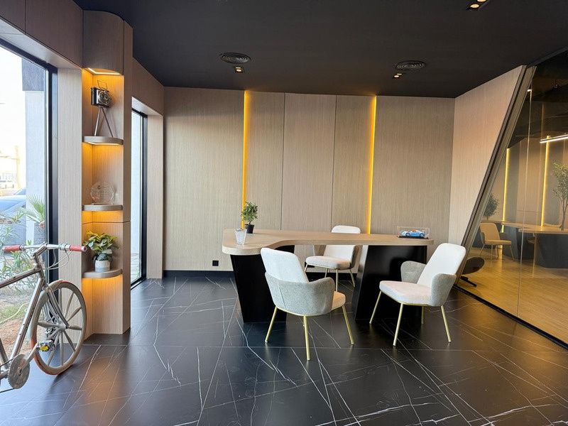 Client meeting area with backlit wall panels